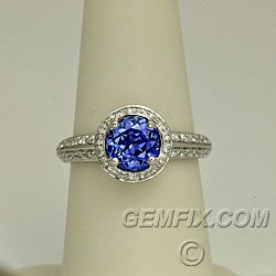 Blue Sapphire halo diamond ring